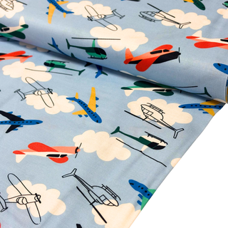 Tela Estampada de 100% Algodón 44/45" Aviones, Azul Claro - 1 yarda