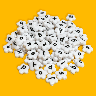 White Flowers with Black Alphabet Beads; 28 grams