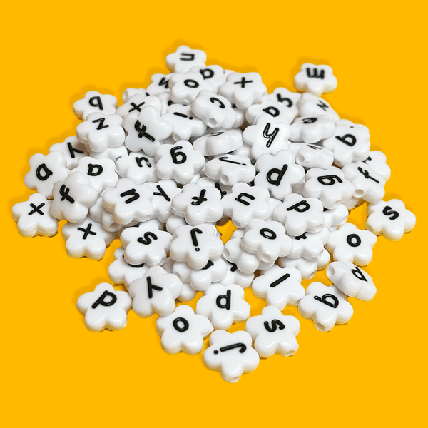 White Flowers with Black Alphabet Beads; 28 grams