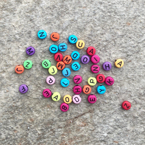 Muticolor Background Alphabet Beads; 28 grams