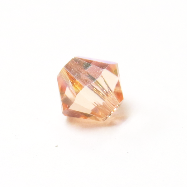 Swarovski Crystal, Bicone, 5mm - Light Peach AB; 20 pcs